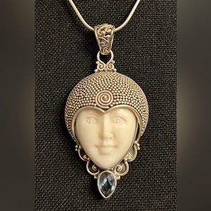 Buffalo Bone (Moon Face) Sterling Silver Pendant With Topaz